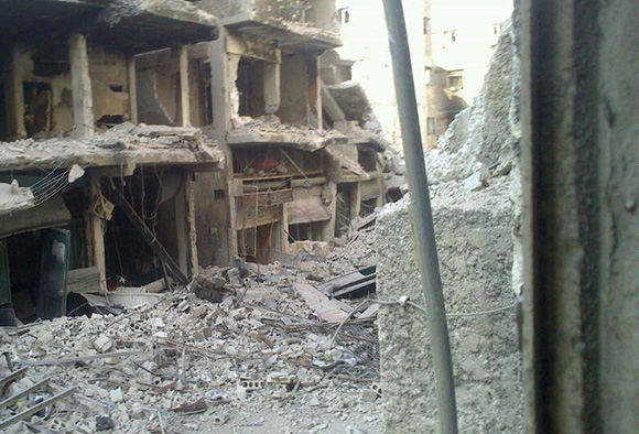 20 percent of houses in Yarmouk have been completely destroyed by artillery and aerial strikes and 40 percent of houses critically damaged.