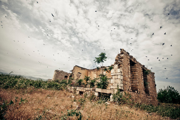 A ruined building in the Agdam – the town was abandoned due to the fighting.  Image credit: Marco Fieber