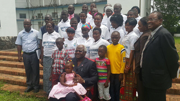 President Koroma poses with Ebola survivors at State House. Image credit: Abdul Brima.