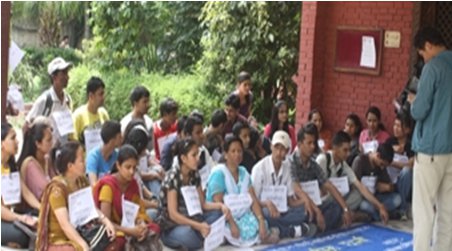 Campaigners in a sit-in in front of UML party Office