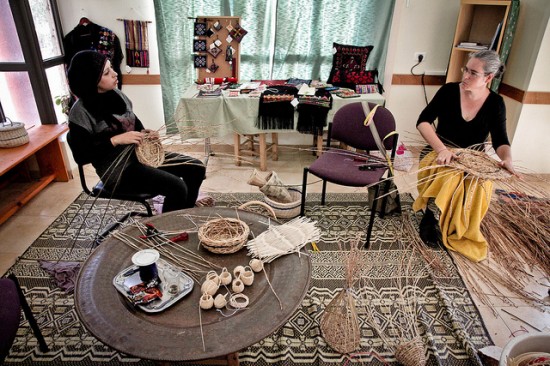 A Palestinian and an Israeli woman make hand woven baskets to be sold at Fair Trade and Fair Peace, a charity that promotes trade between Palestine and Israel. Image credit: Individuell Människohjälp https://flic.kr/p/j4Ch33