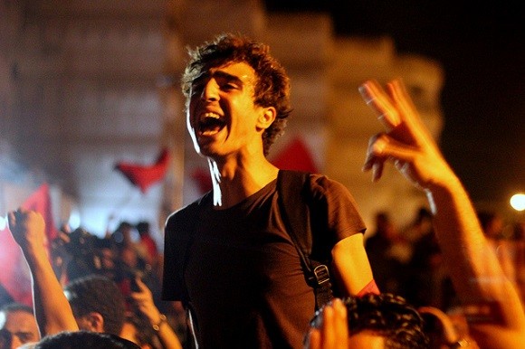 Protesters in 2013. The Arab spring began in the Tunisian capital, Tunis, in January 2011. Image credit: Amine Ghrabi.