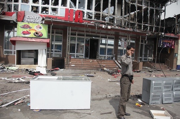 Many homes and properties were destroyed during the 2010 riots, such as this supermarket. Image credit: Inga Sikorskaya.