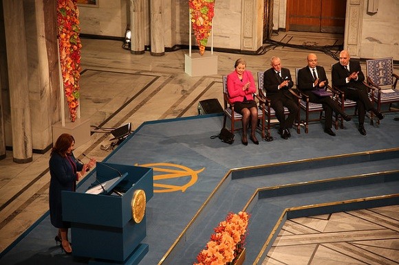 Ouided Bouchamaoui, from the Tunisian Confederation of Industry, Trade and Handicrafts, speaks at the 2015 Nobel Peace Prize ceremony in Oslo. Image credit: Utenriksdepartamentet UD.