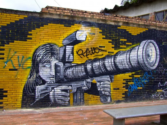 Street art in Colombia depicts violence in every day life. Image credit: Frank Plamann